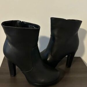 Black platform heel boots